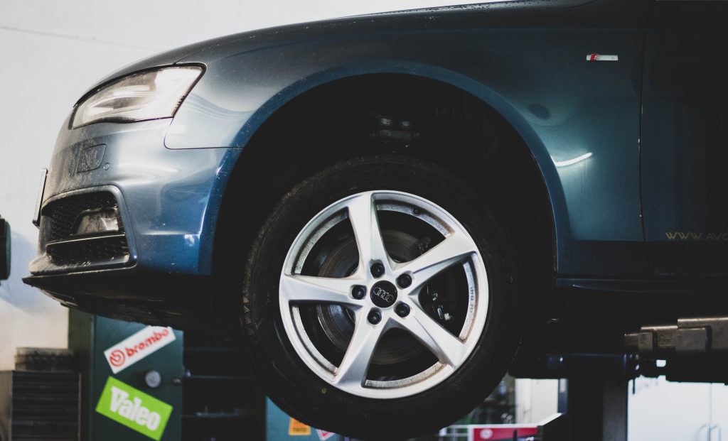 Audi wheel and suspension on a workshop hoist