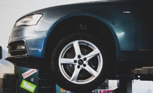 Audi wheel and suspension on a workshop hoist