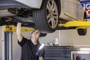 staff at vorsprung automobil working in the shop