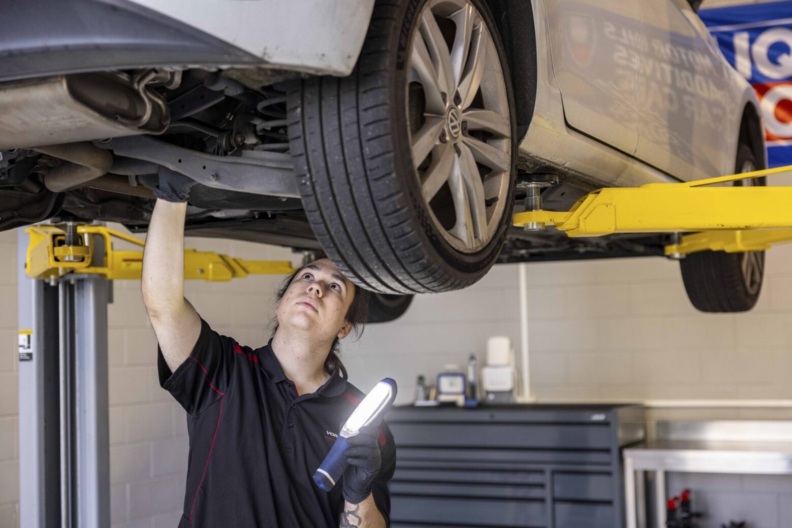 staff at vorsprung automobil working in the shop