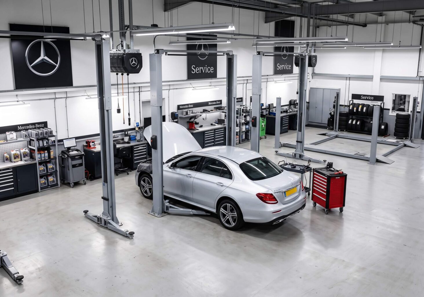 silver mercedes benz in the workshop